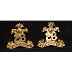 D325. St John Fusiliers Collar badge pair