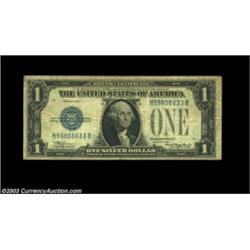 Fr. 1605 $1 1928E Silver Certificate. Fine+.An evenly circulated example of this key piece to the se