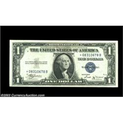 Fr. 1611* $1 1935B Silver Certificate. Gem Crisp Uncirculated.A difficult to obtain star. Important.