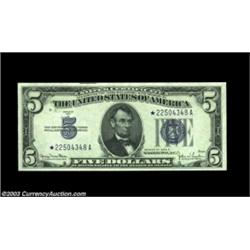 Fr. 1654* $5 1934D Silver Certificate. Gem Crisp Uncirculated.Bright and beautifully centered on bot