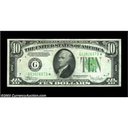 Fr. 2008-G* $10 1934C Federal Reserve Note. About Uncirculated.A faint fold is present that prevents