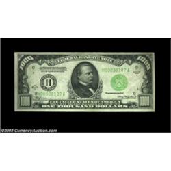 Fr. 2212-H $1000 1934A Federal Reserve Note. About Uncirculated.An attractive note with a center fol