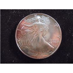1990 AMERICAN SILVER EAGLE UNC TONING ON REV.