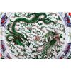 Image 2 : [CHINESE]A "DAQINGKANGXINIANZHI"MARKED WUCAI GLAZED PORCELAIN PLATE PAINTED WITH DRAGON AND PHOENIX 