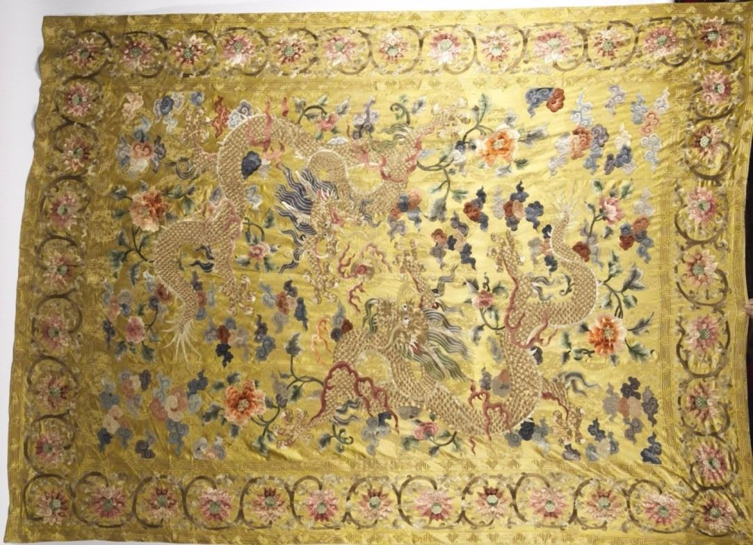 A CHINESE SILK EMBROIDERED BLANKET OVERLAY