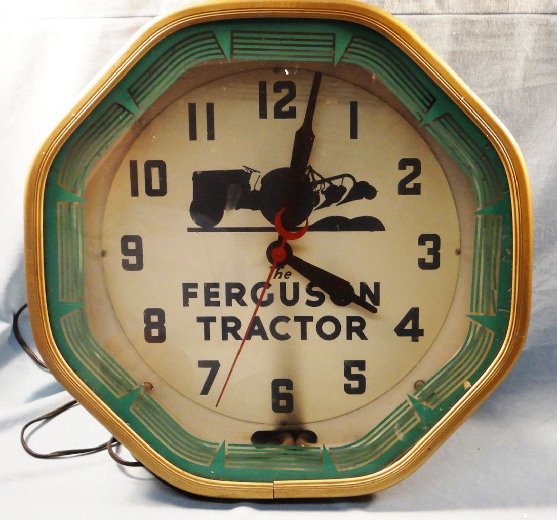 Ferguson tractor advertising neon wall clock, metal case,electric and working. Very cool. 18 1/2" h