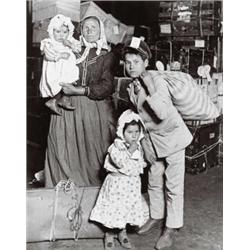 LEWIS HINE, (American, 1874-1940), ITALIAN IMMIGRANT FAMILY LOOKING FOR LOST LUGGAGE, label with ...