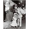 Image 1 : LEWIS HINE, (American, 1874-1940), ITALIAN IMMIGRANT FAMILY LOOKING FOR LOST LUGGAGE, label with ...
