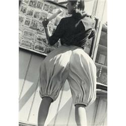 NORMAN PARKINSON, (British, 1913-1990), PAMELA MINCHIN IN PANTALOONS, BRIGHTON PIER, signed "Norm...