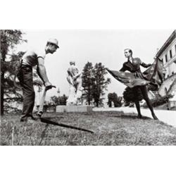 HELMUT NEWTON, (German, b. 1920), WOMAN AND GARDENER,, LAKE COMO, ITALY, signed "Helmut Newton", ...
