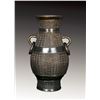 Image 1 : A BRONZE VASE