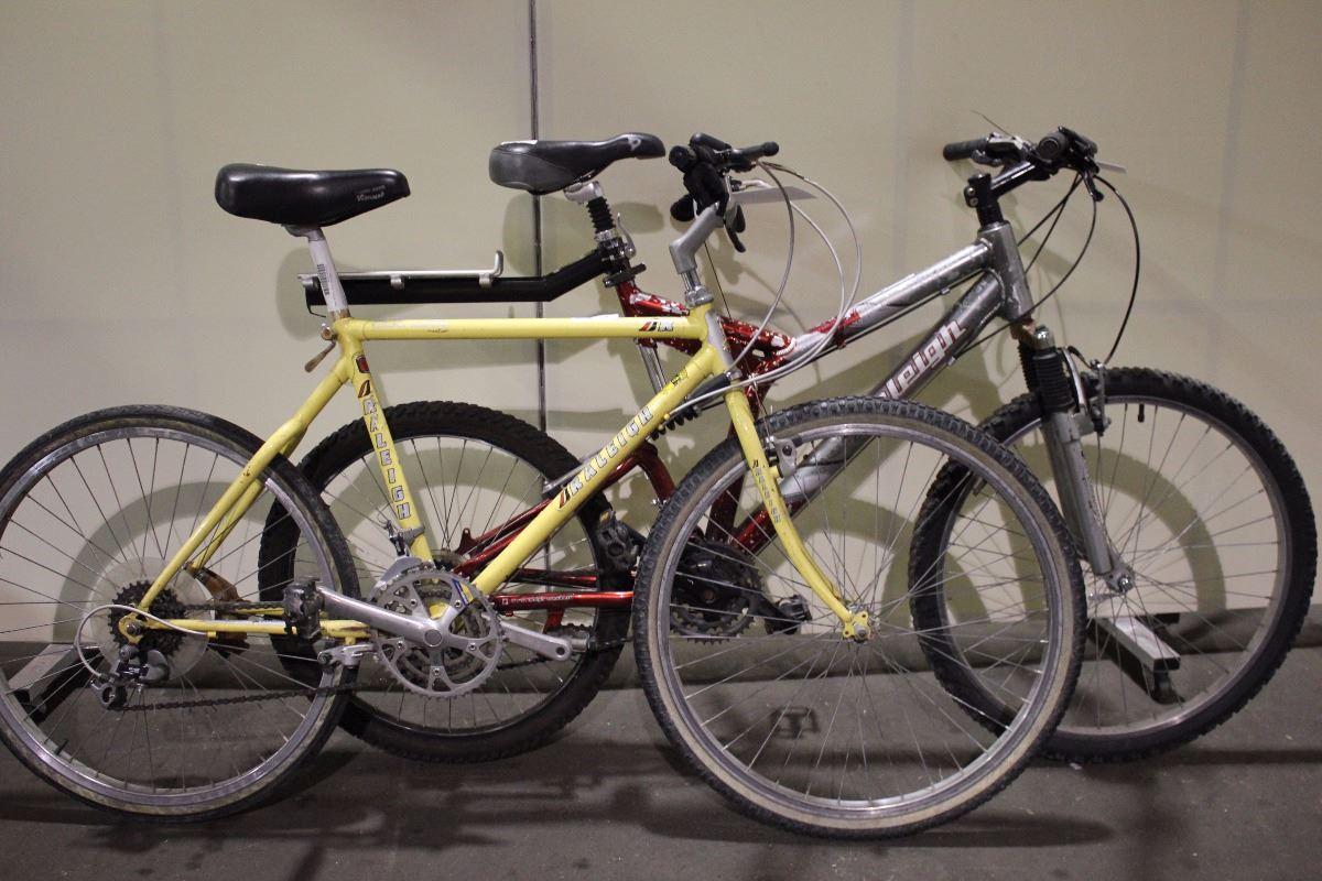 2 BIKES: RED RALEIGH FULL SUSPENSION MOUNTAIN BIKE &YELLOW RALEIGH ...