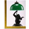 Image 2 : Bronze monkey desk lamp with green glass lamp shade.