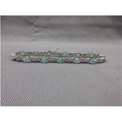 6+ CT Blue Topaz Infinity design bracelet
