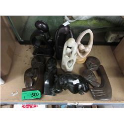 8 Carved stone figurines