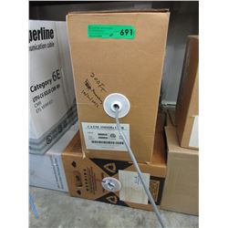 2 Partial spools of electronic cable