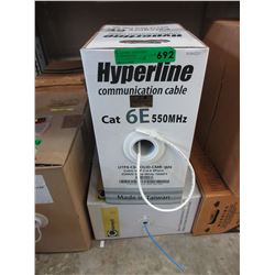 2 Partial spools of communication cable