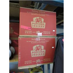 2 Cases of popped popcorn