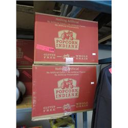 2 Cases of popped popcorn