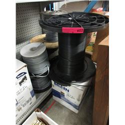 6 Partial spools of telecommunication wire