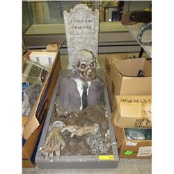 Tombstone & "Wake from Grave" statue