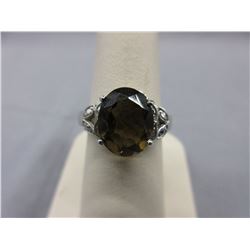 4.5 CTW Brown Topaz ring set with 4 Diamonds