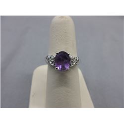 Oval Amethyst solitaire ring with accent Diamonds