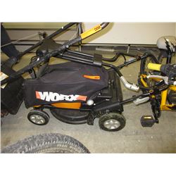 Used electric lawnmower with bag attachment