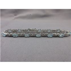 Blue Topaz & Diamond figure 8 bracelet