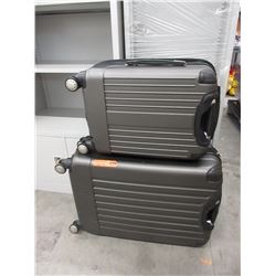 2 Pieces of Ricardo rolling luggage - used