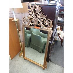 Ornate wood framed wall mirror - used.