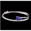 Image 1 : 14KT White Gold 3.21ct Tanzanite and Diamond Bangle Bracelet