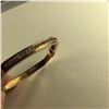 Image 2 : ONE 14KT YELLOW GOLD NATURAL RUBY & DIAMOND SET BANGLE STYLE BRACELET SET WITH A TOTAL OF 14 ROUND