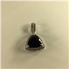 Image 1 : ONE 14KT WHITE GOLD DARK BLUE SAPPHIRE AND DIAMOND PENDANT. SET WITH ONE 4.58CT NATURAL, UNTREATED