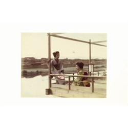 Travel [Japan], TWO GIRLS AT RIVERSIDE JAPAN, a hand-coloured albumen print with pencil annotat...