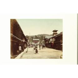 Travel [Japan], ROAD TO IKUTA TEMPLE KOBE, a hand-coloured albumen print with pencil annotation...