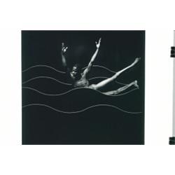 Brickell, Mark, A silver print of a naked man surrounded by wave patterns. Matted., 15" x 15"...