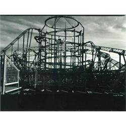 Livick, Stephen (1943- ), Black & white photograph of a carnival ride signed and numbered # 771...