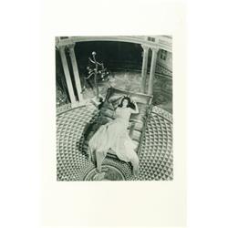 [Sophia Loren], A gelatin silver print of Sophia Loren in a reclining position. Printed in nega...