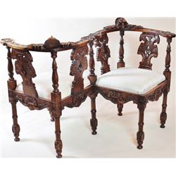 Contemporary carved mahogany gossip