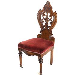 Early walnut side chair with pierce carved back,