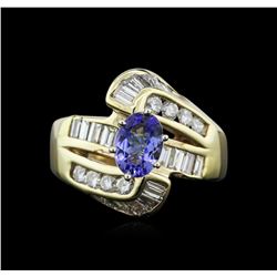 0.80ct Tanzanite and Diamond Ring - 14KT Yellow Gold