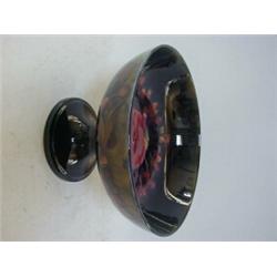A MOORCROFT FOOTED BOWL, mid 20th Century, tube-lined pomegranate pattern on a green/blue ground,...