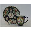 Image 1 : A MATCHED WORCESTER COFFEE CAN AND SAUCER, c.1760, exotic birds in cartouches on blue scale groun...