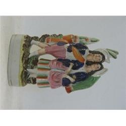 A STAFFORDSHIRE FLATBACK FIGURE GROUP, 19th Century, courting couple in Irish costume, (base chip...