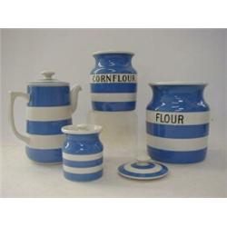 THREE T.G. GREEN BLUE CORNISH WARE JARS, and covers, 'Flour', height 16cm, 'Cornflower', height 1...