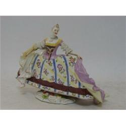 A PARIS PORCELAIN FIGURE, late 19th Century, lady in 18th Century costume, height 16cm  40-60...