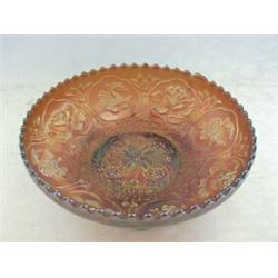 AN AMBER CARNIVAL GLASS FOOTED DISH, 'Dragon and Lotus' pattern, diameter 20cm  40-60...