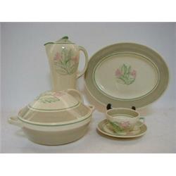 A SUSIE COOPER DINNER AND BREAKFAST SET COMBINED, floral sprays pattern, three oval platters, two...