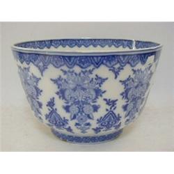 A TIN GLAZED EARTHENWARE PUNCH BOWL, 19th Century, underglaze blue decoration after Berain, marke...